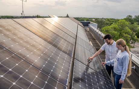 students working with solar panels