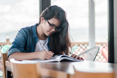 Student studying at table