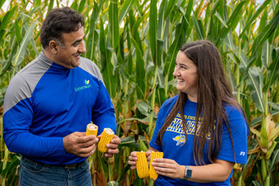 SDSU Student and Professor in a Corn Field